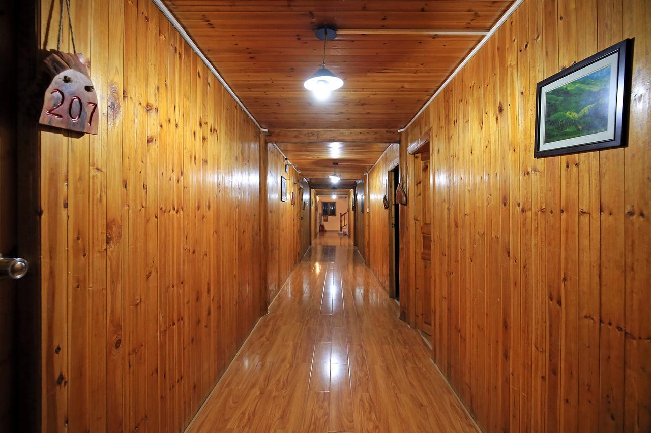 Wanjinglou Guest House Луншэн Экстерьер фото