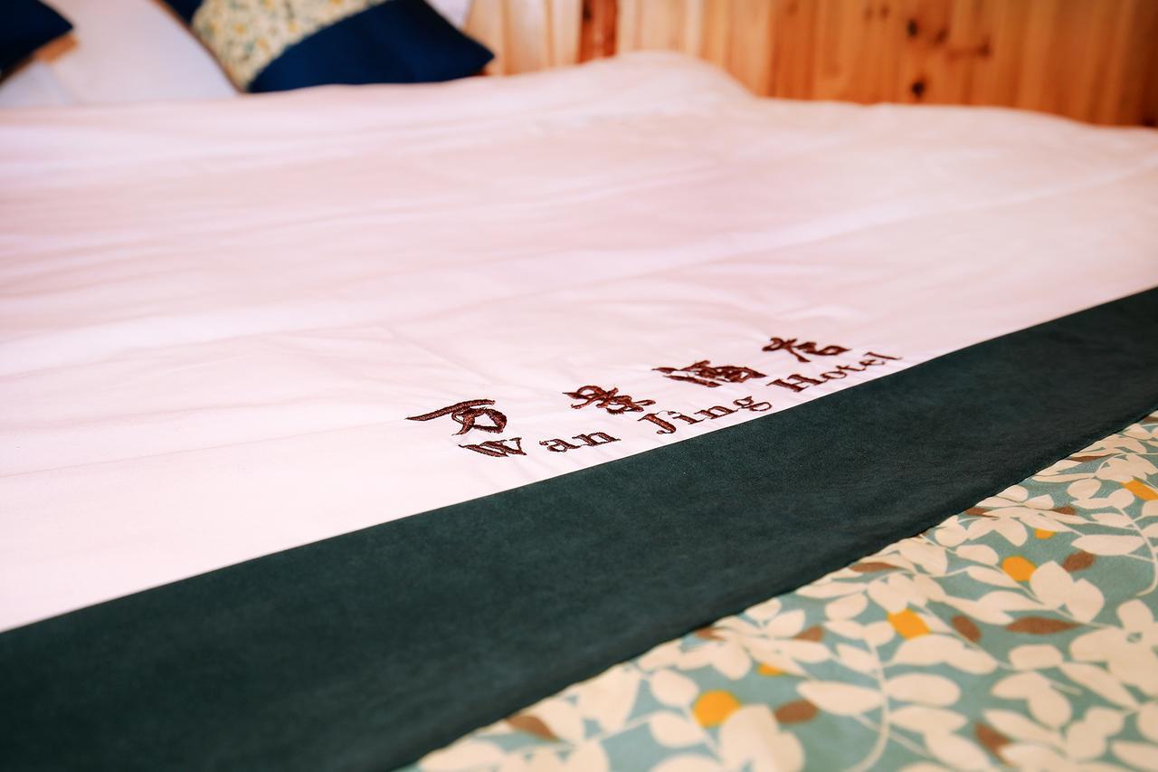 Wanjinglou Guest House Луншэн Экстерьер фото